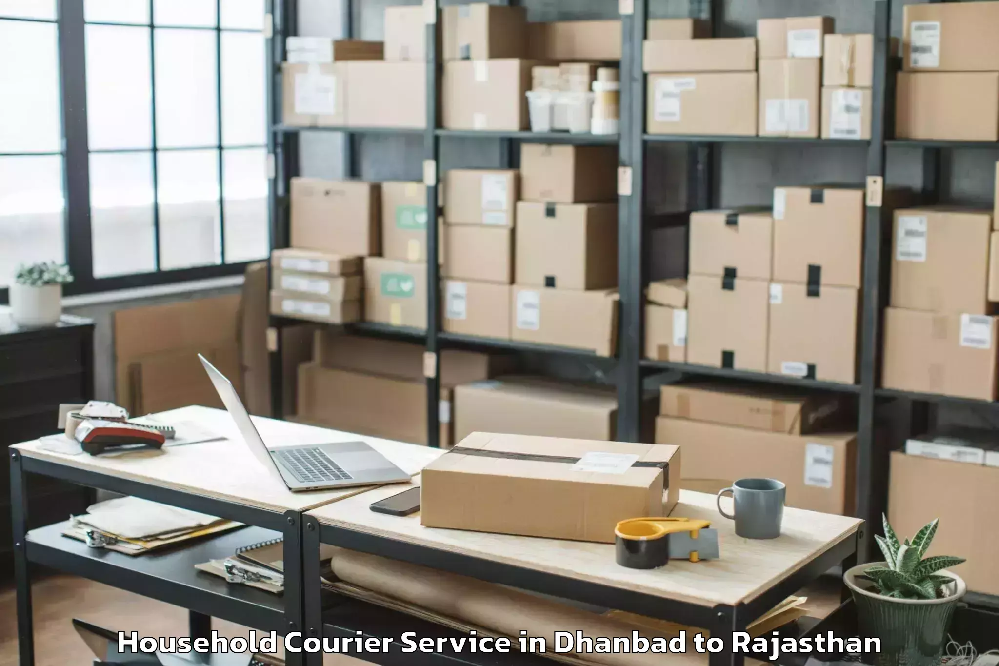 Easy Dhanbad to Bagar Household Courier Booking